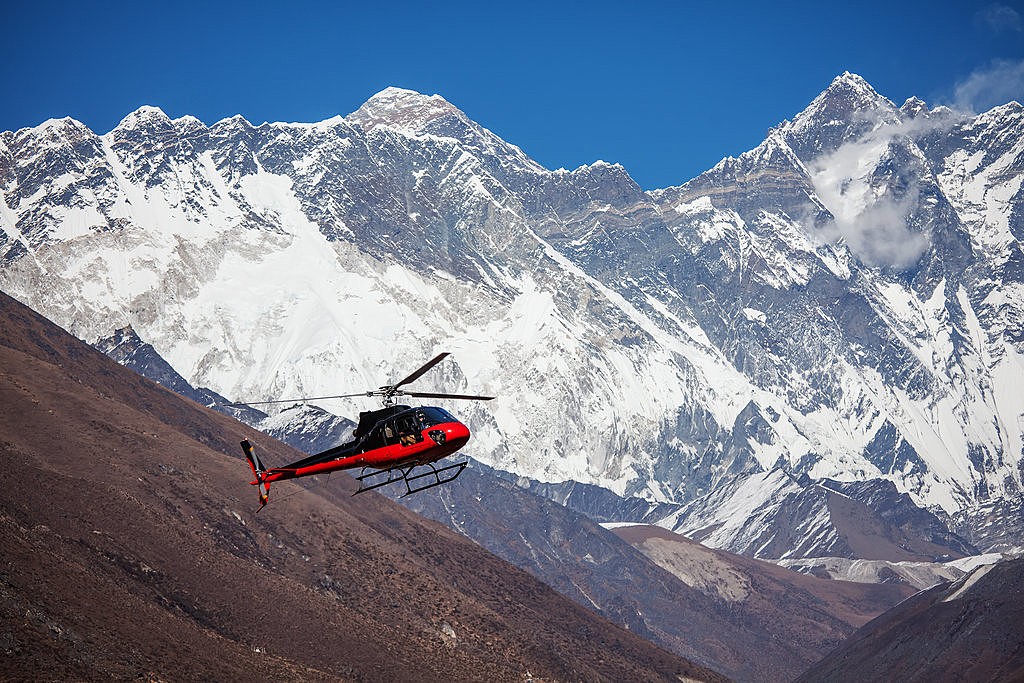 Lifeguard Helicopter In Himalaya Mountains In Nepal